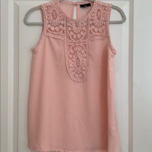 Pink sleeveless top